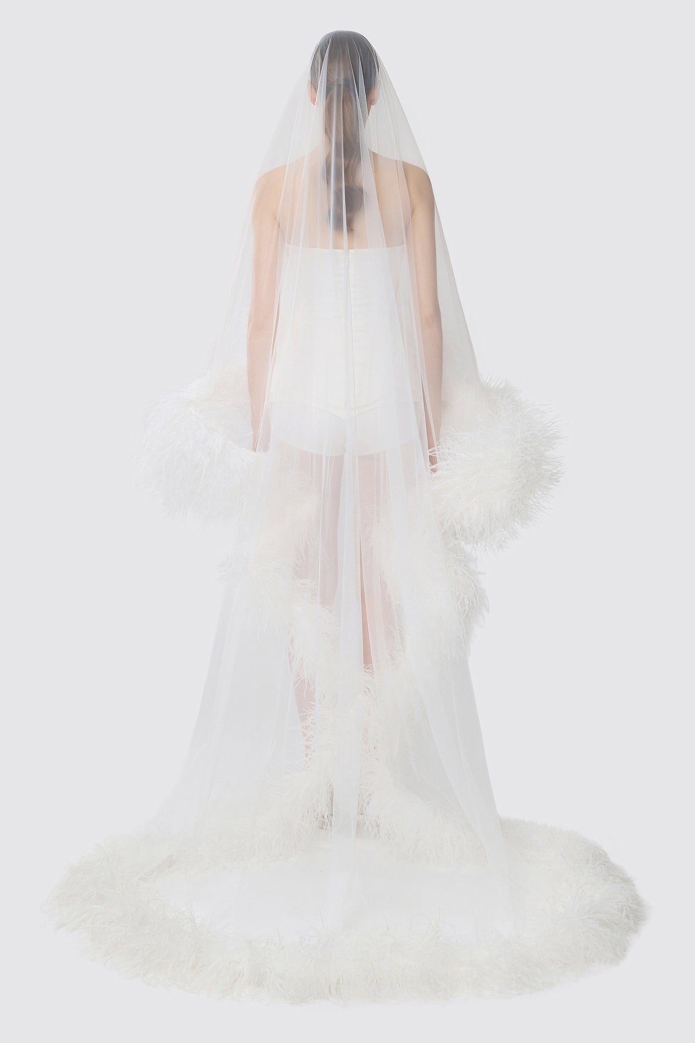 LONG VEIL WITH A FEATHER